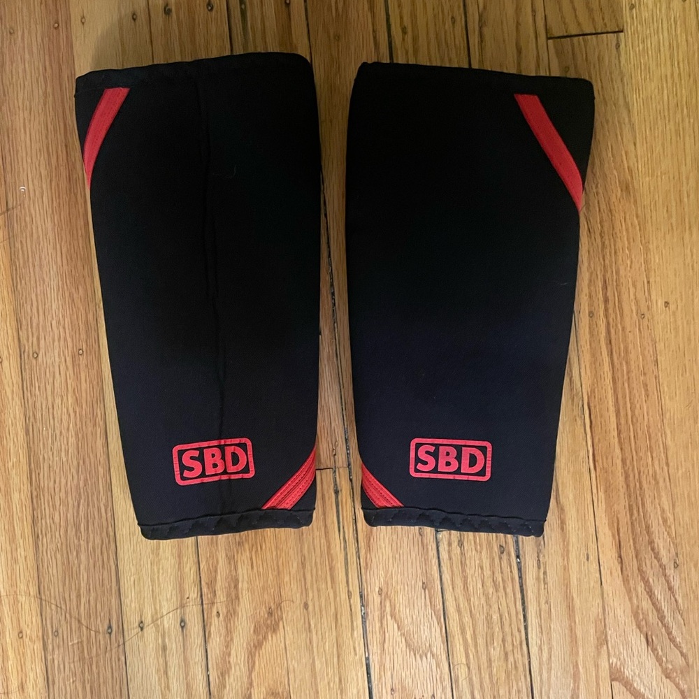 SBD Black and Red Knee Sleeves size SMALL